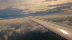 Glider above clouds