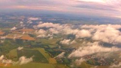 Glider above clouds